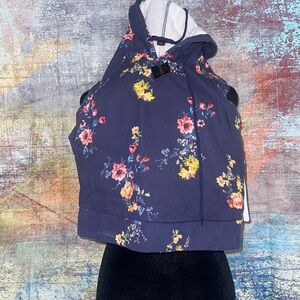 Material Girl Cropped sleeveless hooded top. Navy blue with floral design